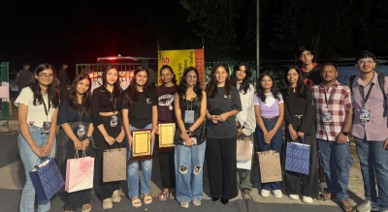 A group of women standing together

AI-generated content may be incorrect.